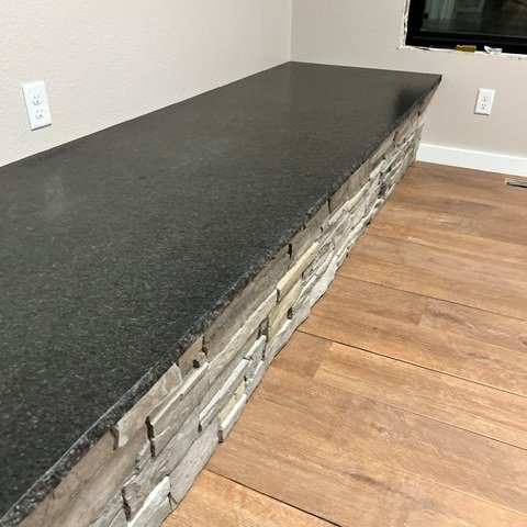 Fireplace – Black Pearl Granite with a chiseled edge profile